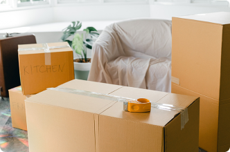 Packed boxes and furniture in a room